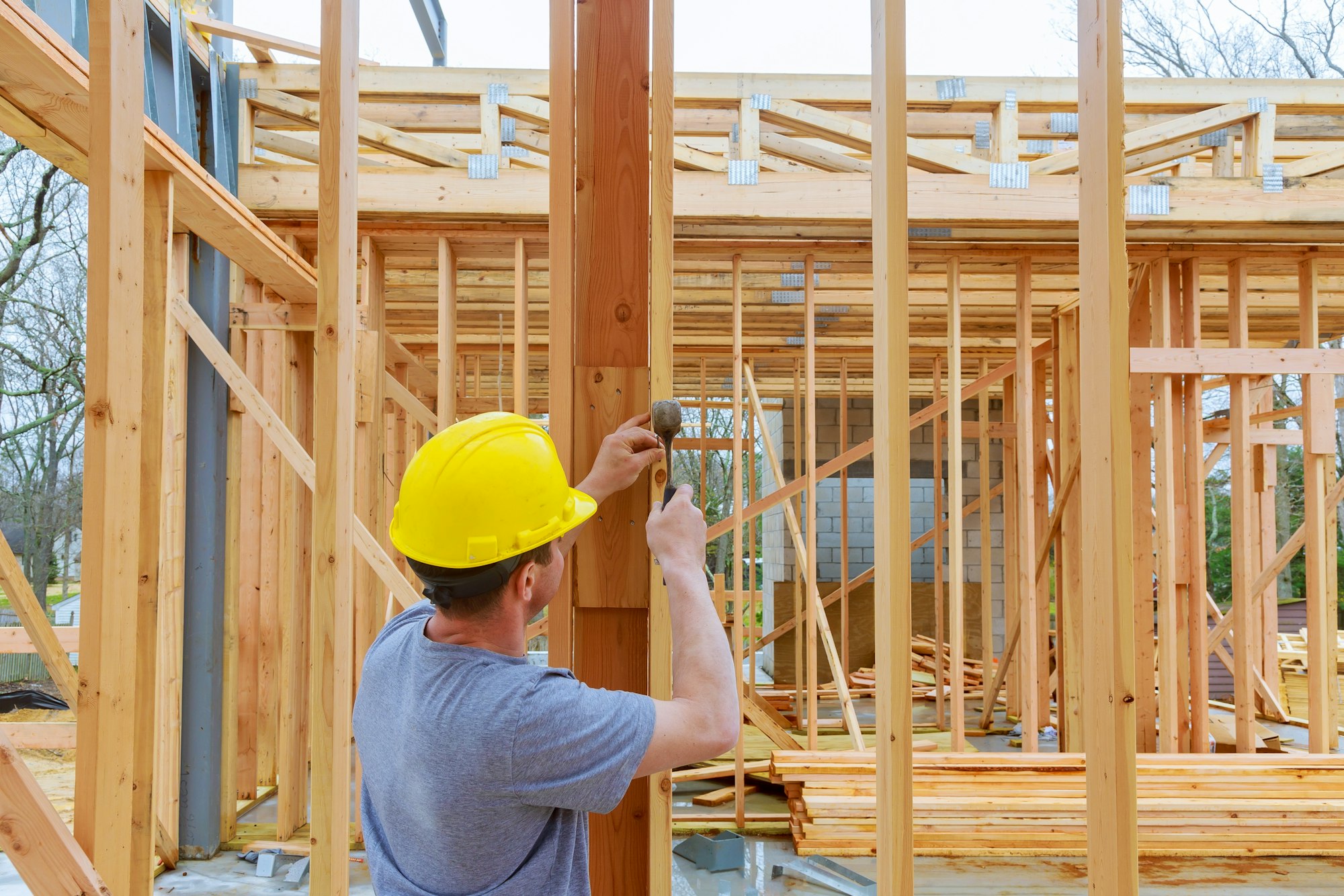 Construction crew working on of a new, commercial apartment building